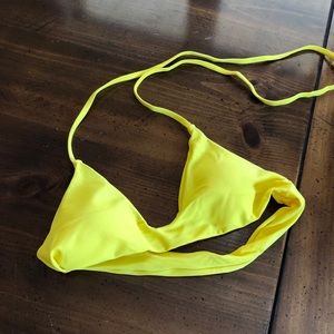 Bright yellow swimsuit top
